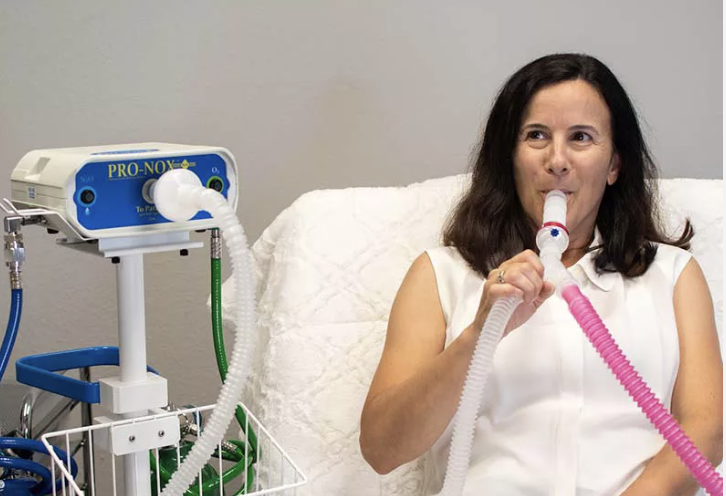 Image of woman using pro-nox machine